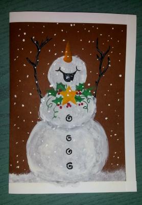 Für meine Oma gab es dieses Jahr (zu einer selbstbeklebten Kerze) eine Glücklicher-Schneemann-Karte.